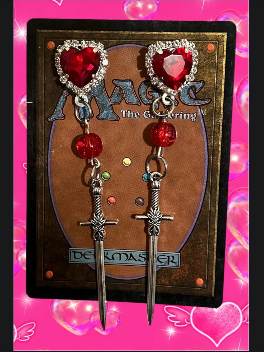 Pierced heart dagger sword earrings